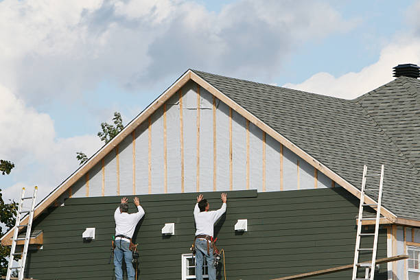 Professional Emergency Siding Repair technician working in Monroeville, OH